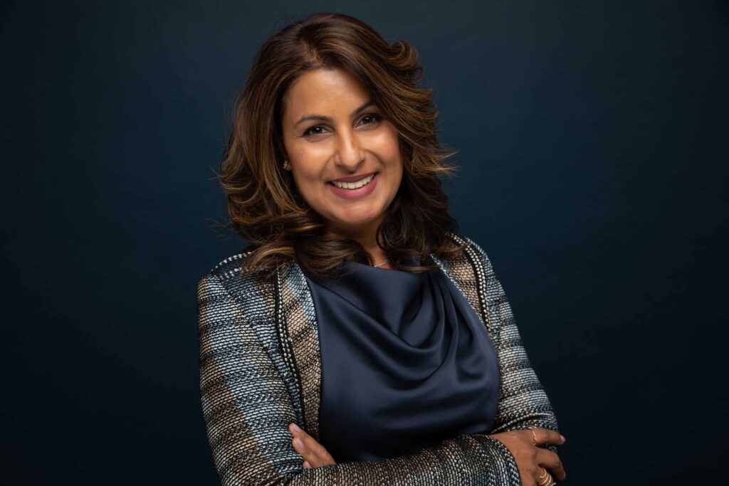 Headshot of TriageLogic's CEO, Charu Raheja.
